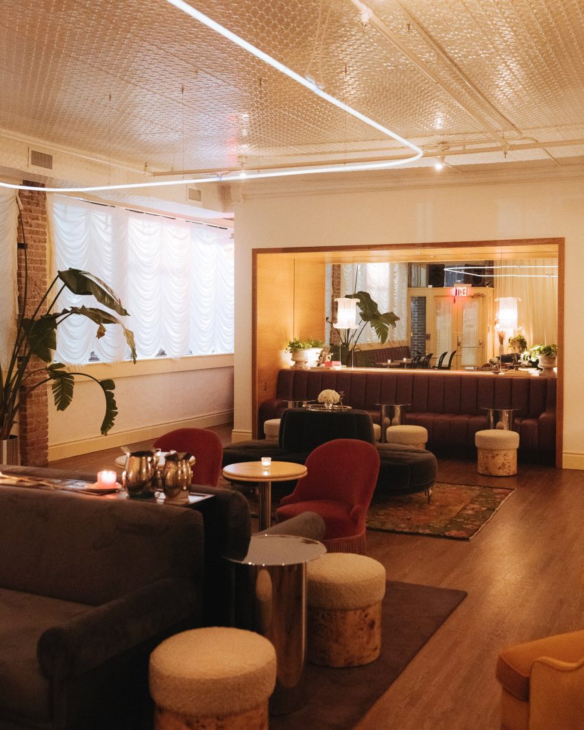 Dimly lit seating area in Le Lounge bar