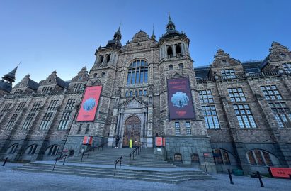 The grand facade of the Nordiska Museet with blue sky