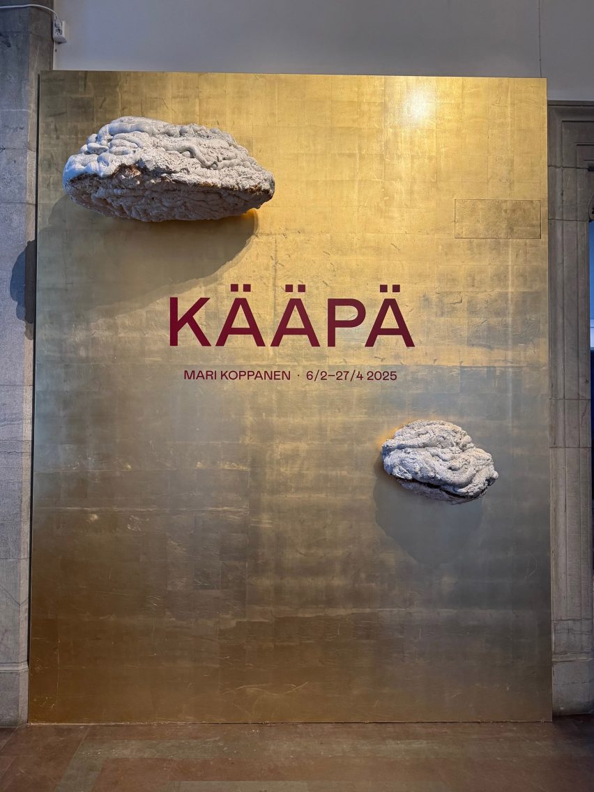 Bronze panel featuring two fungus like growths