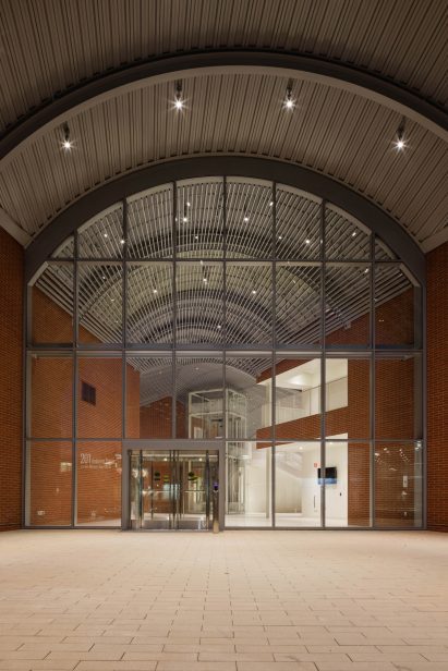 Arched glazed entrance space by SANAA