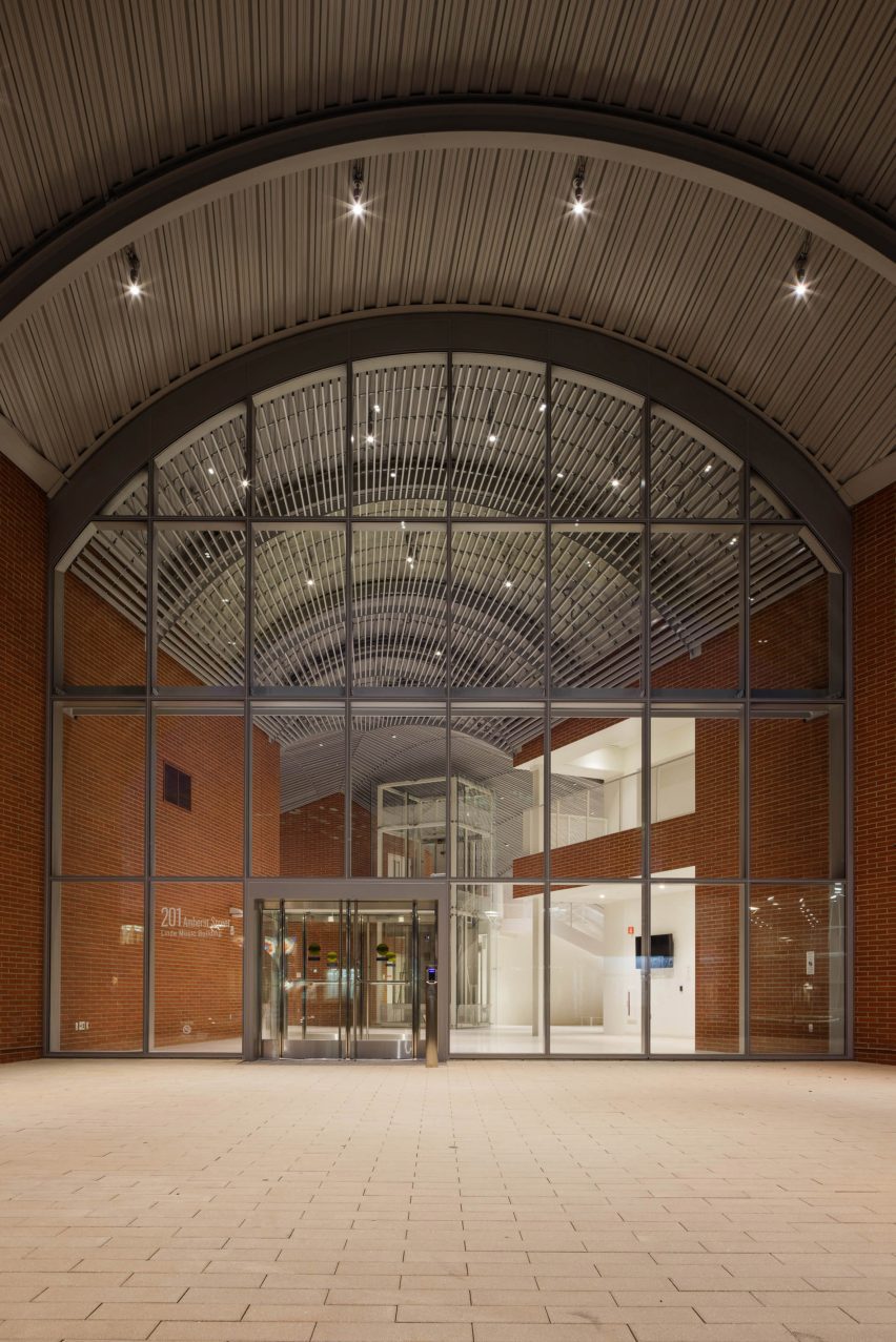 Arched glazed entrance space by SANAA