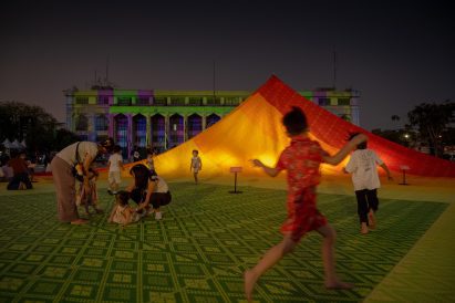 Children playing on the Mega Mat installation by MVRDV at Bangkok Design Week