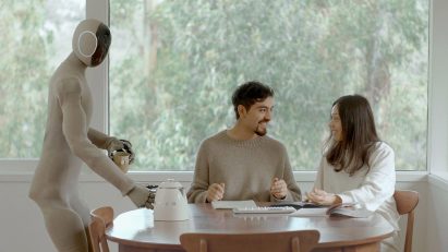 Robot pouring two people tea