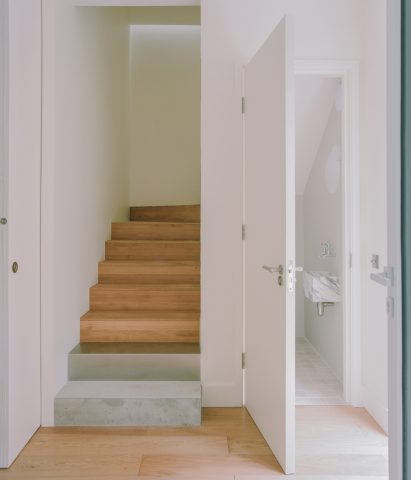 Staircase within Lode townhouse by Nikjoo