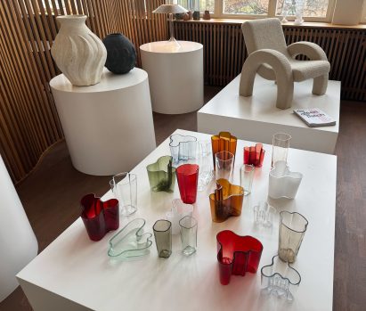 glass vases in a plinth