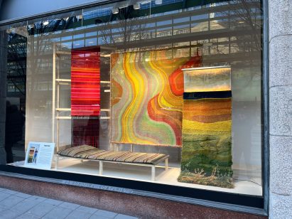 colourful rugs in shop window