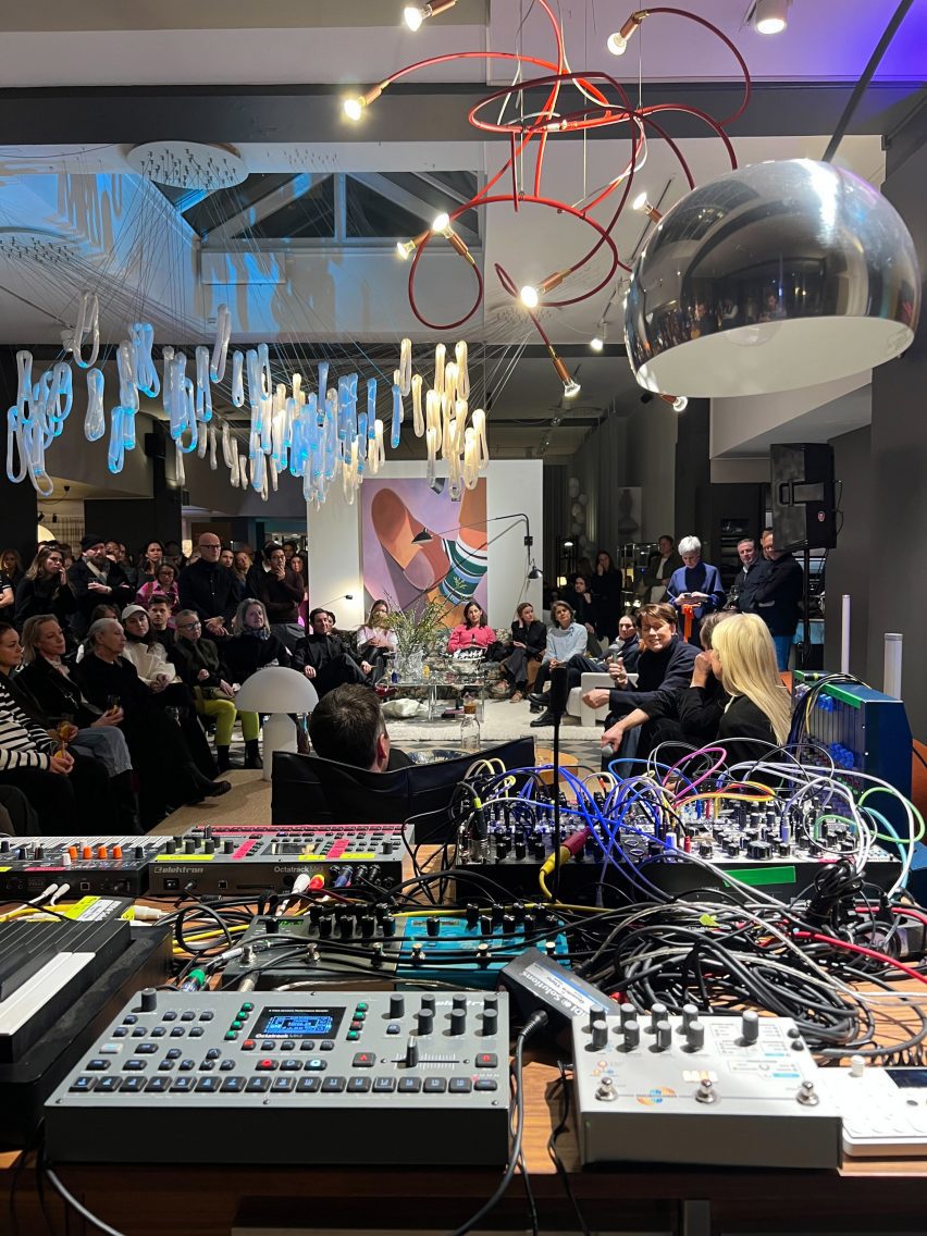 busy retail space viewed beyond DJ decks
