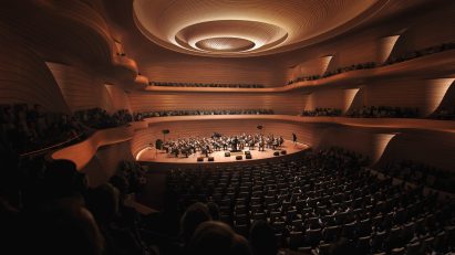 Curved timber theatre stage by BIG