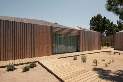 Wooden decks of Casa Donovan by PIMAA Architects
