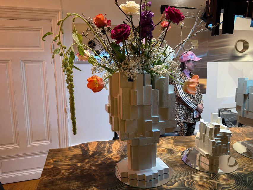 Vase with flowers on domestic table
