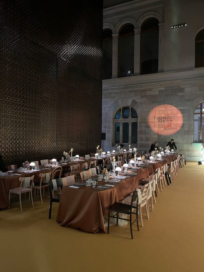 Two long tables set out for dinner
