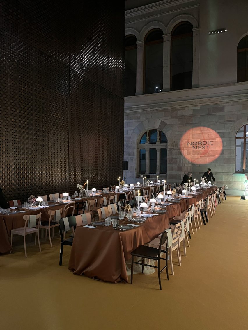 Two long tables set out for dinner