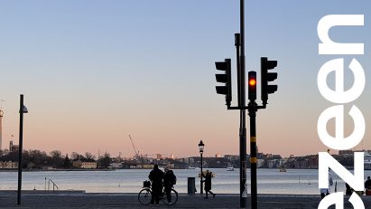 sunset behind traffic lights
