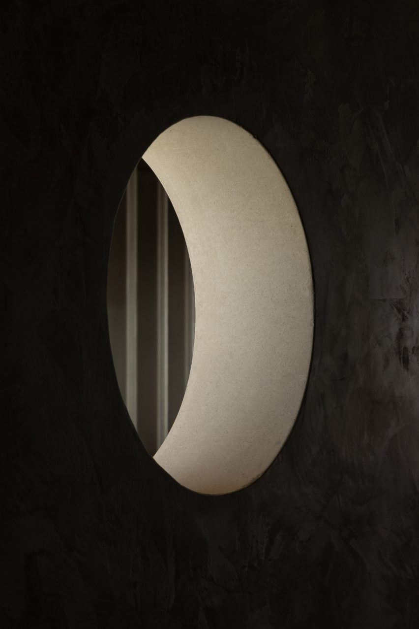 Round window in deep concrete wall