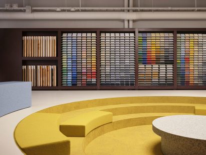 Conversation pit and sample area in showroom by Note Design Studio