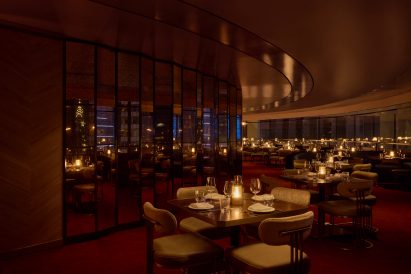 Restaurant withfFaceted antique mirrors and concentric ceiling finishes