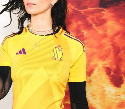 Yellow football shirt with purple and red detailing