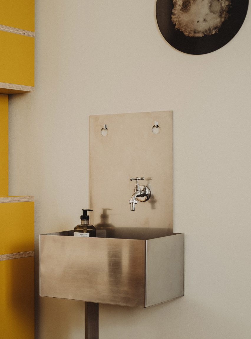 Photograph of a handcrafted steel basin in the bathroom.
