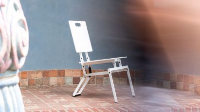 White robotic chair on patio