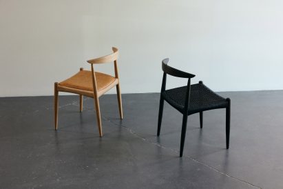 Two chairs, brown and black