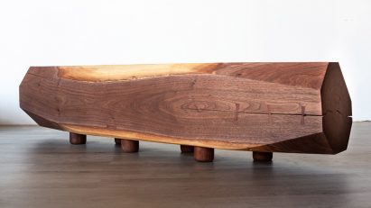 Log-like wooden bench by Ian Love Design