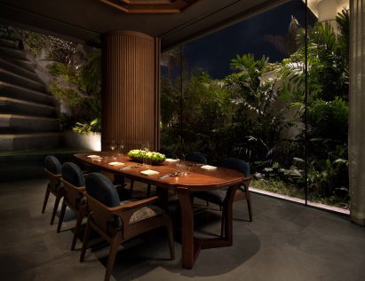 Interior of restaurant with foliage 