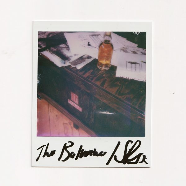 Photo of a polaroid of a bottle of The Balvenie whisky
