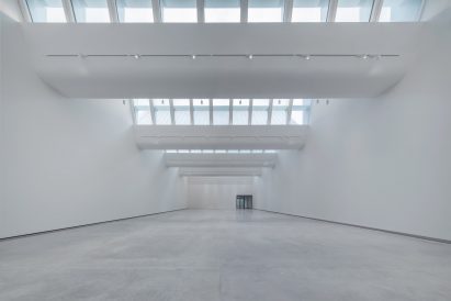 Well-lit gallery interior by WHY Architecture