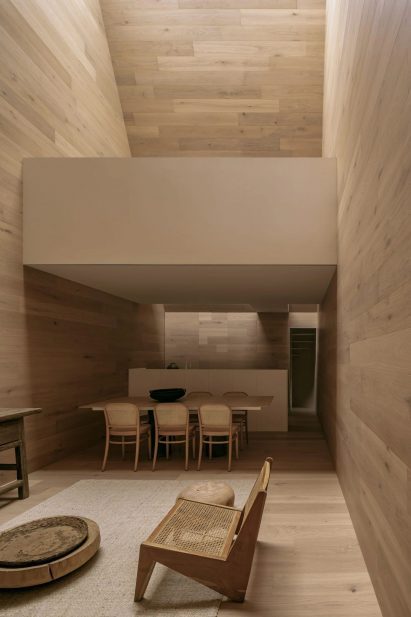 Wood-lined living space with skylight above