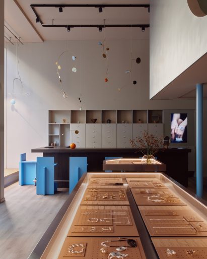 Kalevala flagship store in Helsinki, Finland by Yatofu.