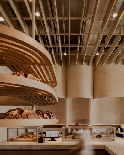 Floating shelves for cooling bread loaves suspended from the ceiling