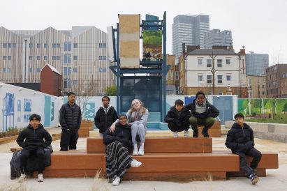 Children sitting beside meanwhile space by Matt+Fiona