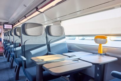 Seating area of train interior by Nendo and Arep