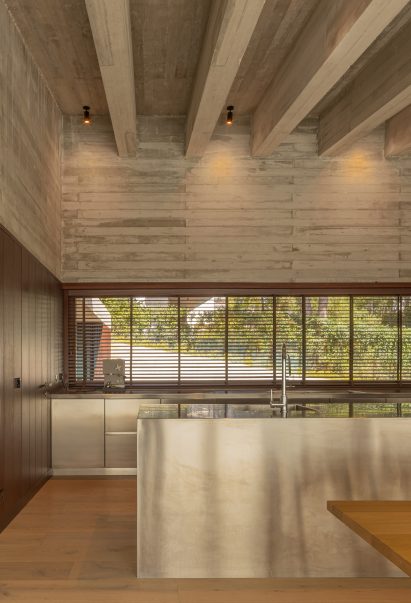 Steel kitchen inside Oeiras House by OODA