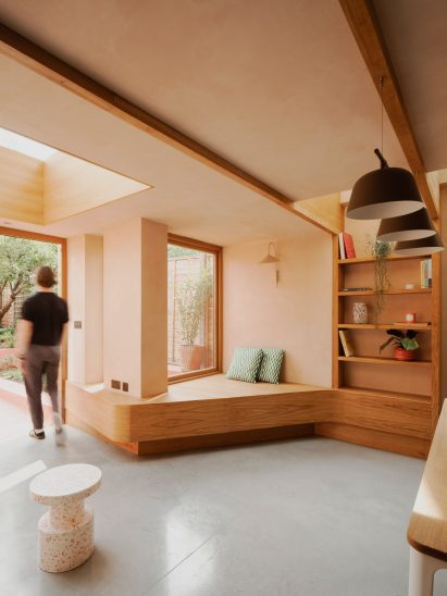 Living space within Clay House by Pensaer