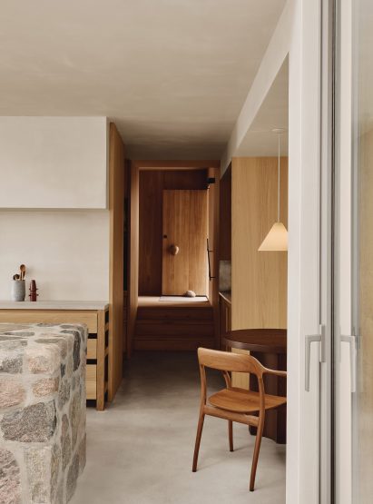 Oak-lined entry visible from a bright living space
