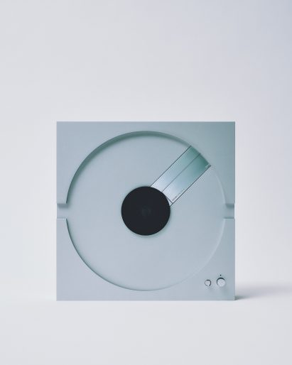 Metal record player on its side