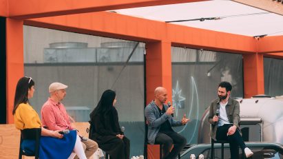 Photo of speakers at a panel discussion at Rivian's Electric Roadhouse at SXSW 2025
