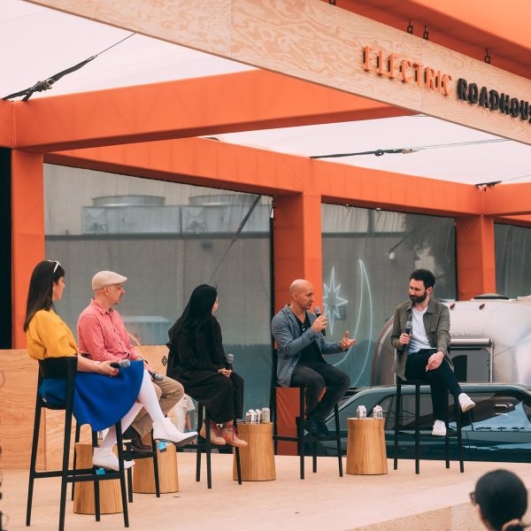 Photo of speakers at a panel discussion at Rivian's Electric Roadhouse at SXSW 2025