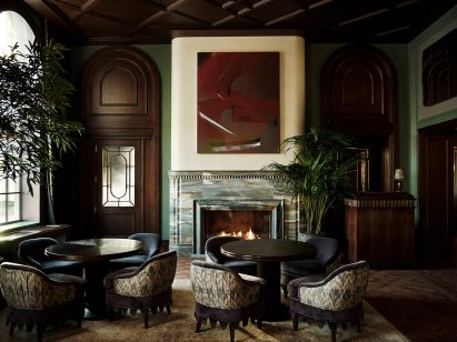 Dark wood panelling and furniture in a parlor room