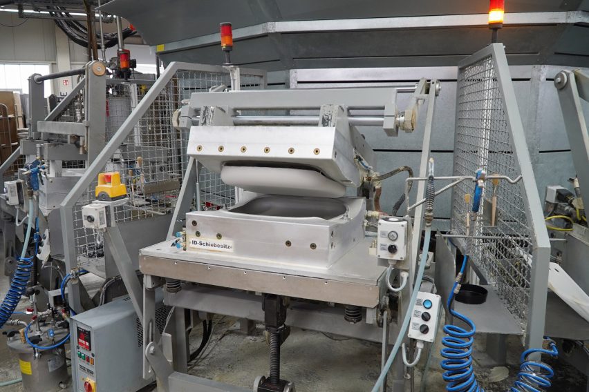 Photo of a machine moulding foam seat cushions in the Vitra factory