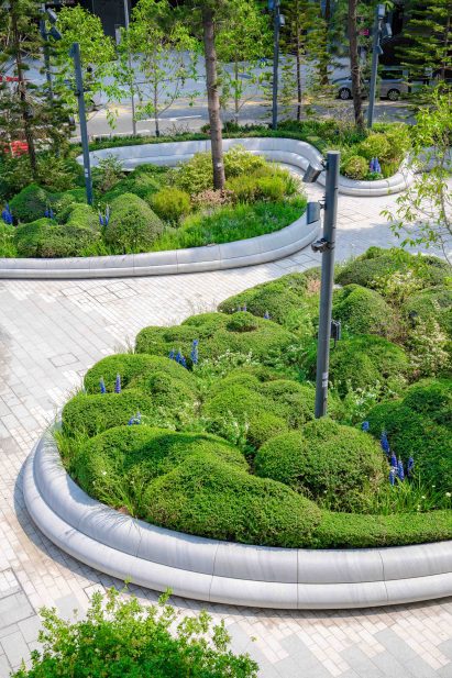 View of planters within art garden by Zaha Hadid Architects