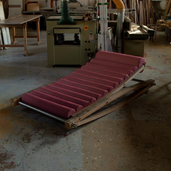 Photo of wooden chair with red fabric