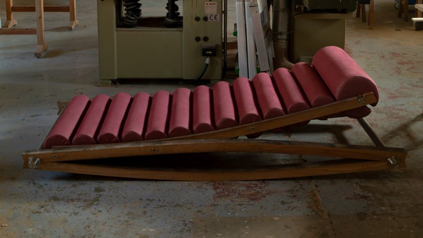 Photo of wooden chair with red fabric