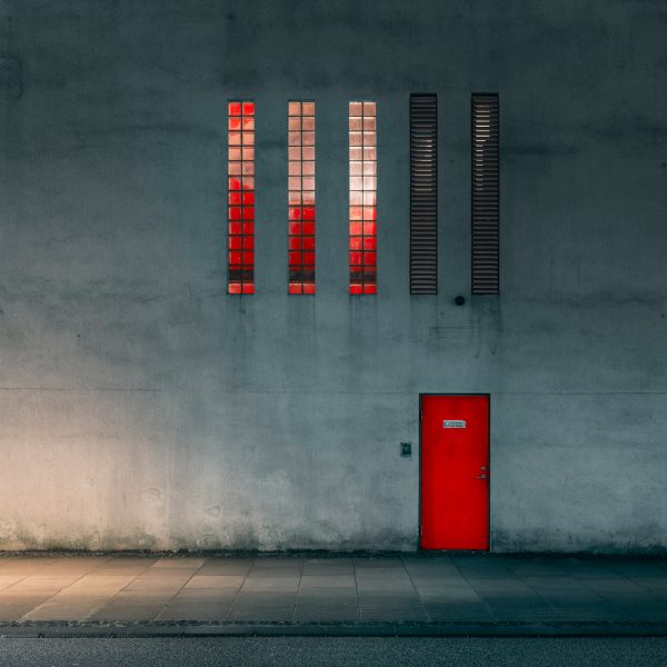 A red door of an old power plant in Aalborg, Denmark