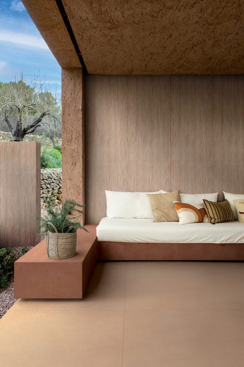 Photo of indoor outdoor seating area with surfaces by Florim