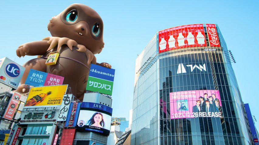 Graphic of a large cartoon creature in a city
