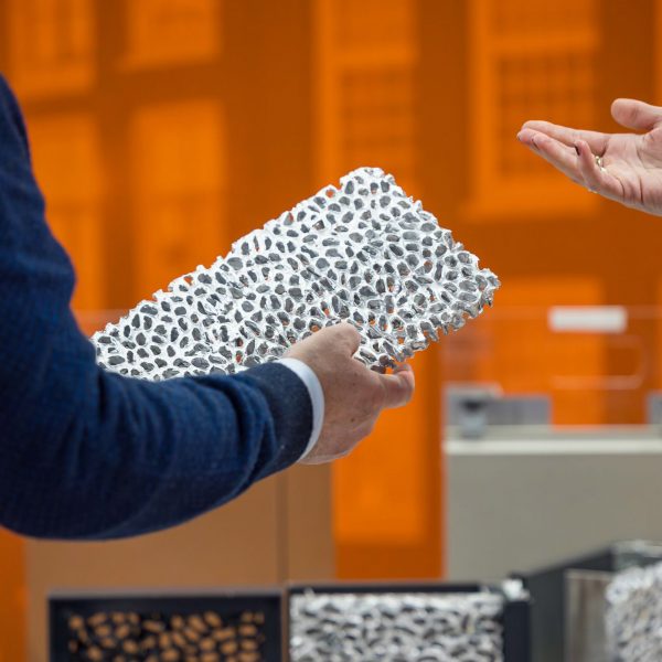 Photo of hand holding surface material