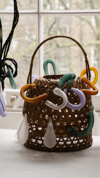 Bamboo baskets with hand-blown glass additions 