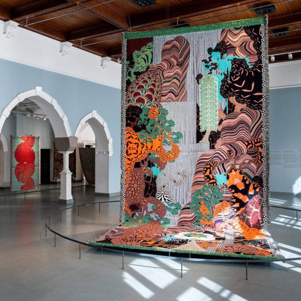 Photo of tapestry hanging from ceiling